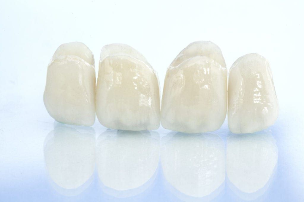 close-up dental crown on isolated background