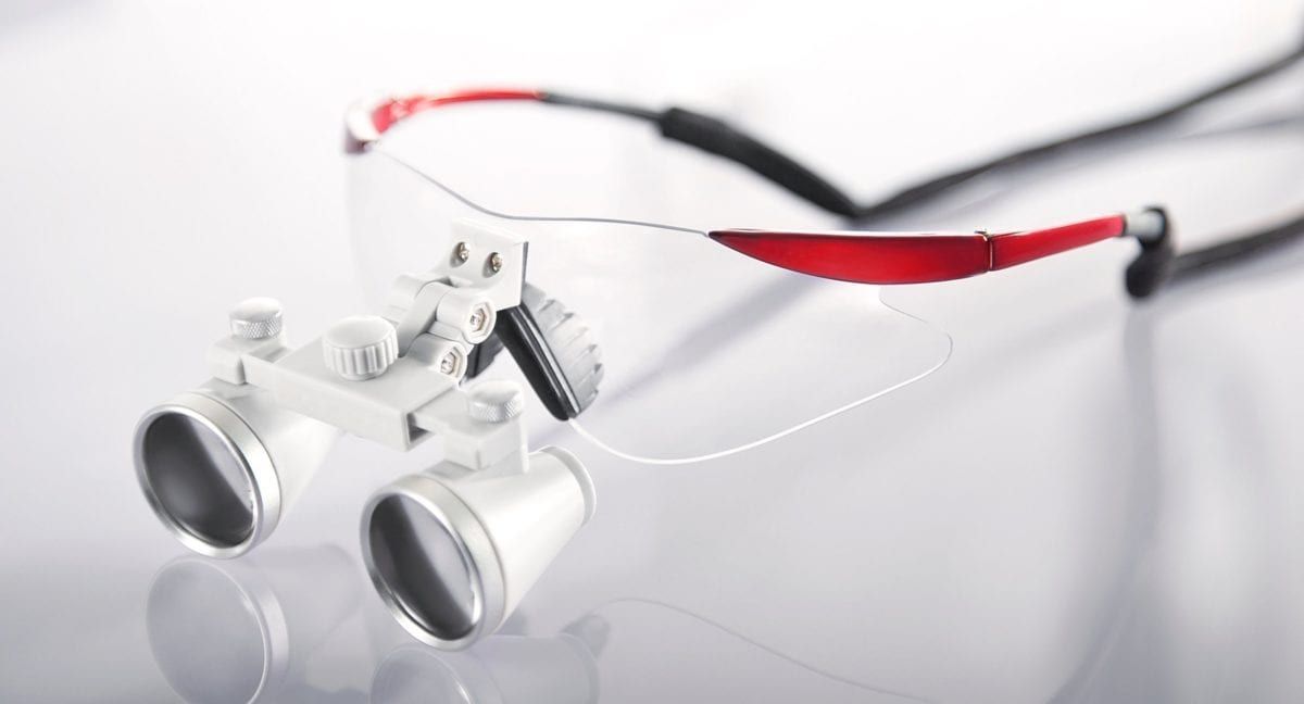 Glasses with attached microscope